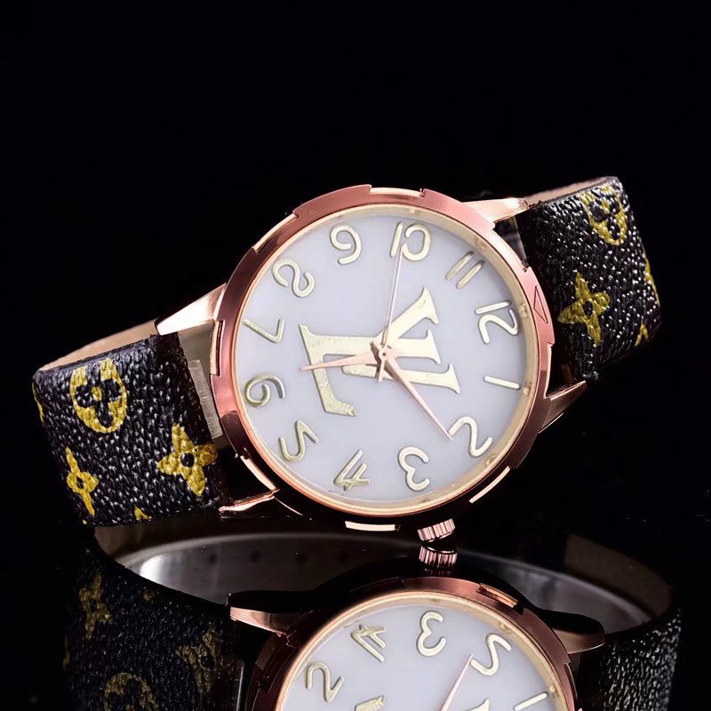 reloj louis vuitton dorado