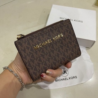 Cartera michael kors discount hombre palacio de hierro